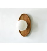 Oval wooden panel and opaline glass globe wall lamp