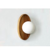Oval wooden panel and opaline glass globe wall lamp
