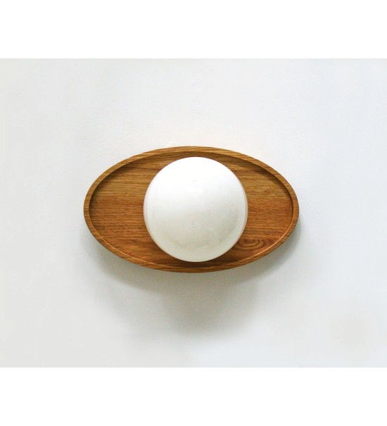 Oval wooden panel and opaline glass globe wall lamp