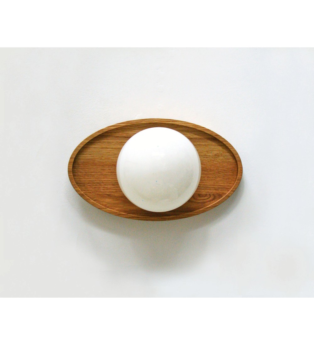 Oval wooden panel and opaline glass globe wall lamp
