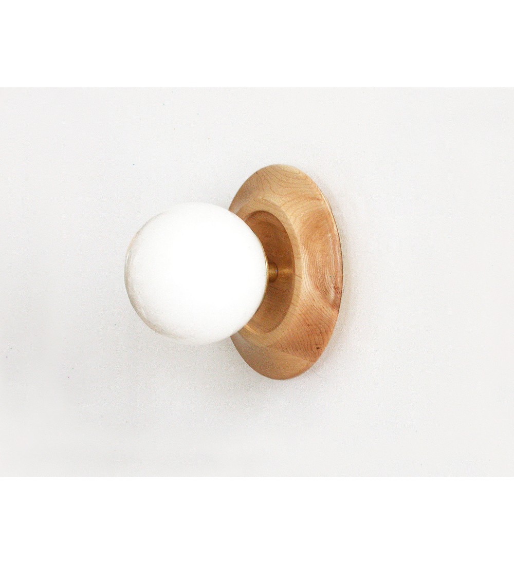 Concave wooden ring and glass globe wall lamp