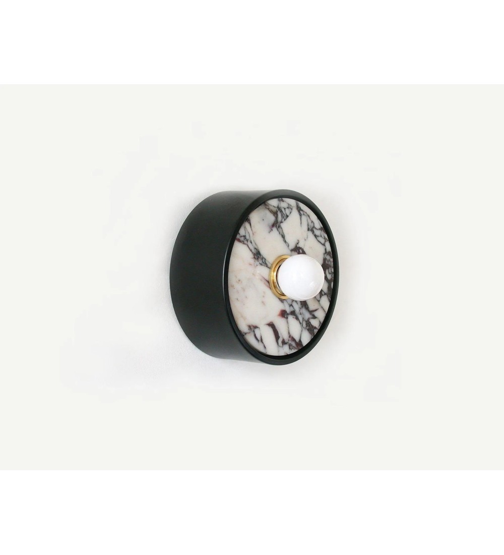Wall sconce with black marble insert and opalescent bulb