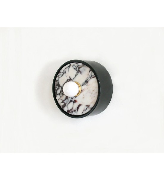 Wall sconce with black marble insert and opalescent bulb