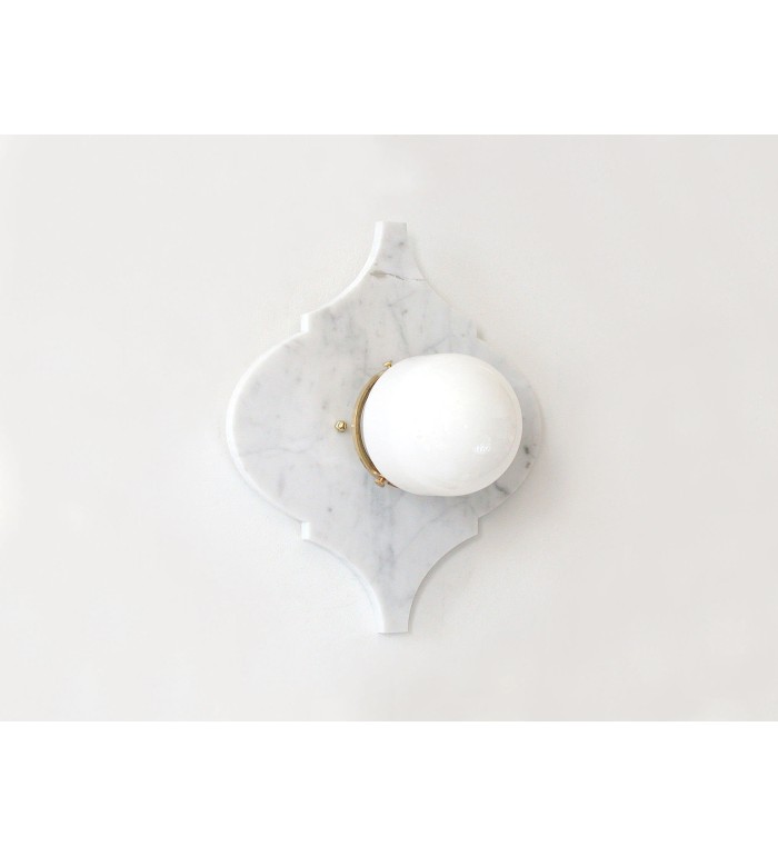 Quatrefoil marble panel and opal sphere wall light