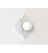 Quatrefoil marble panel and opal sphere wall light