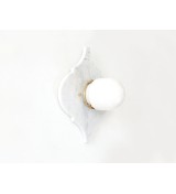 Quatrefoil marble panel and opal sphere wall light