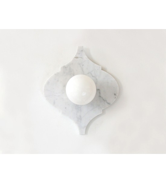 Quatrefoil marble panel and opal sphere wall light