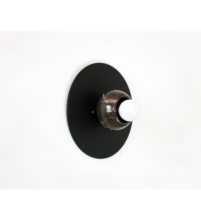Black round marble cup and white bulb wall lamp