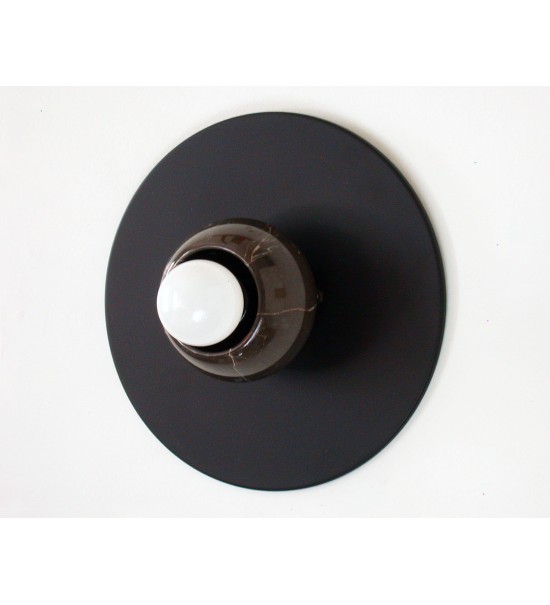 Black round marble cup and white bulb wall lamp