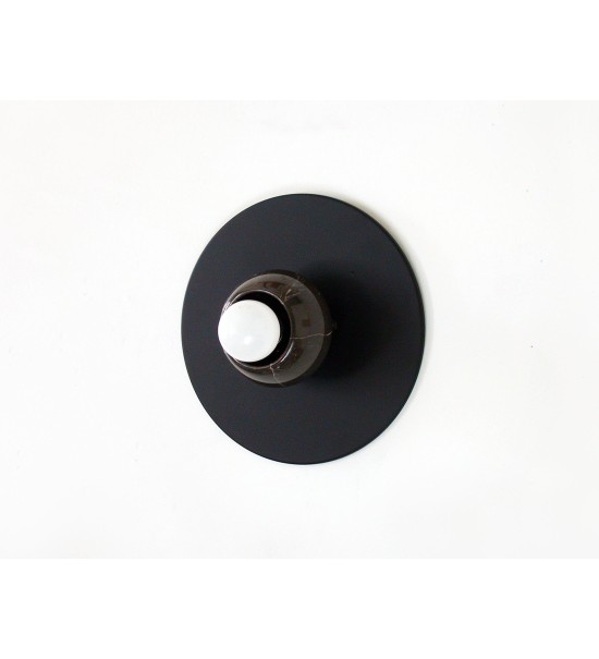 Black round marble cup and white bulb wall lamp