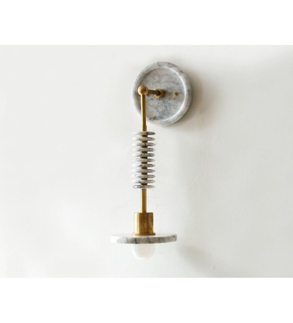Marble slab brass column and stacked ring wall light