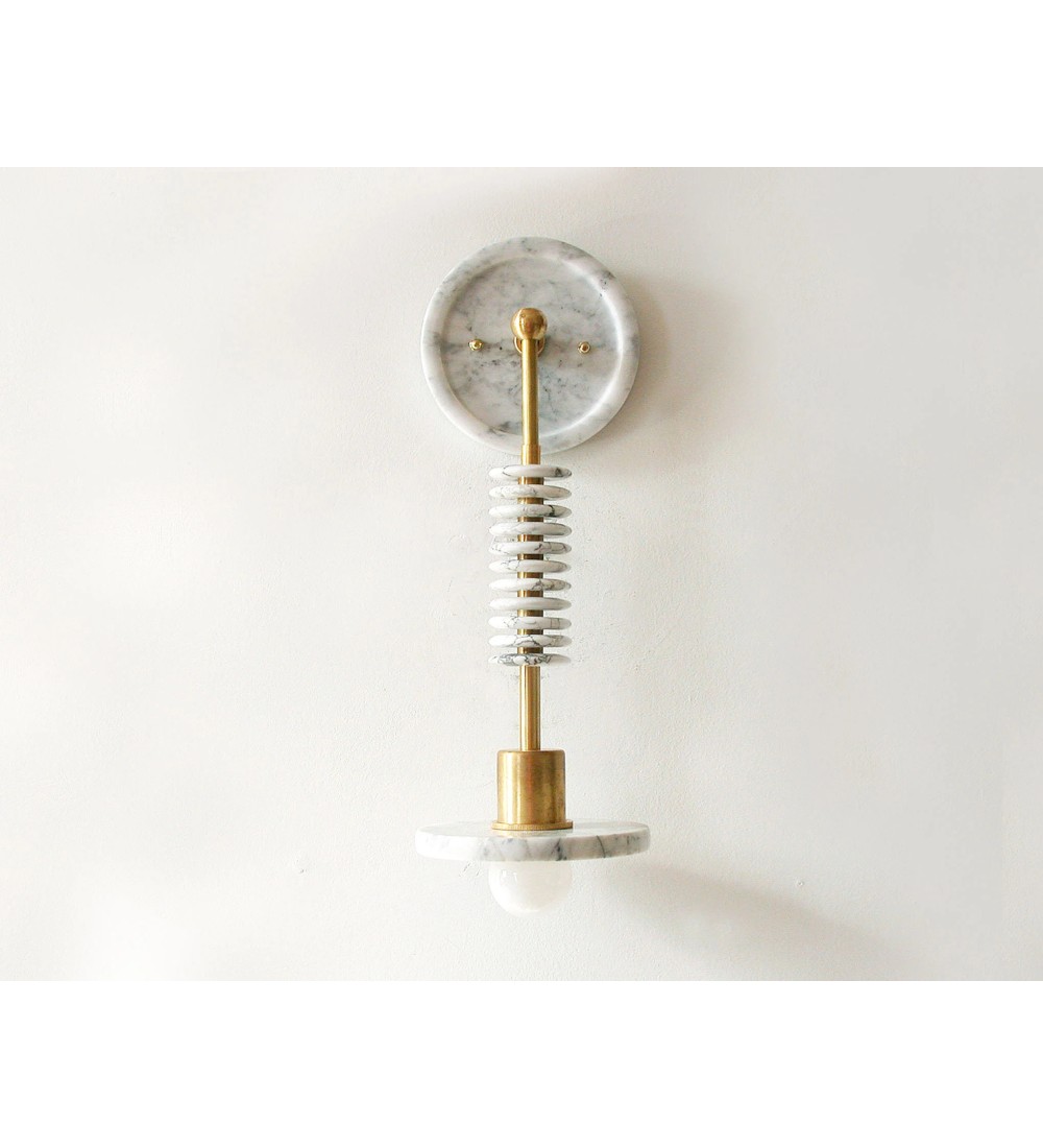 Marble slab brass column and stacked ring wall light