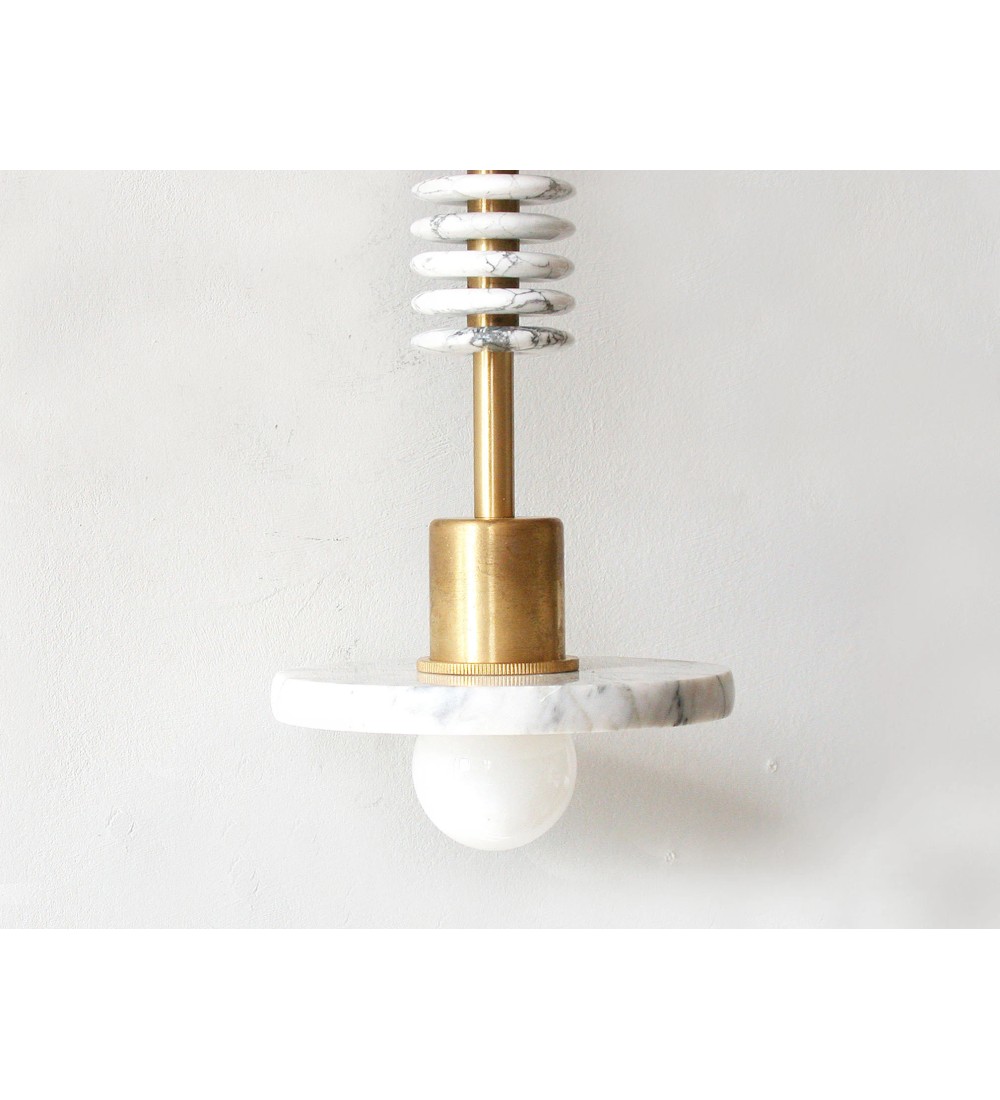 Marble slab brass column and stacked ring wall light